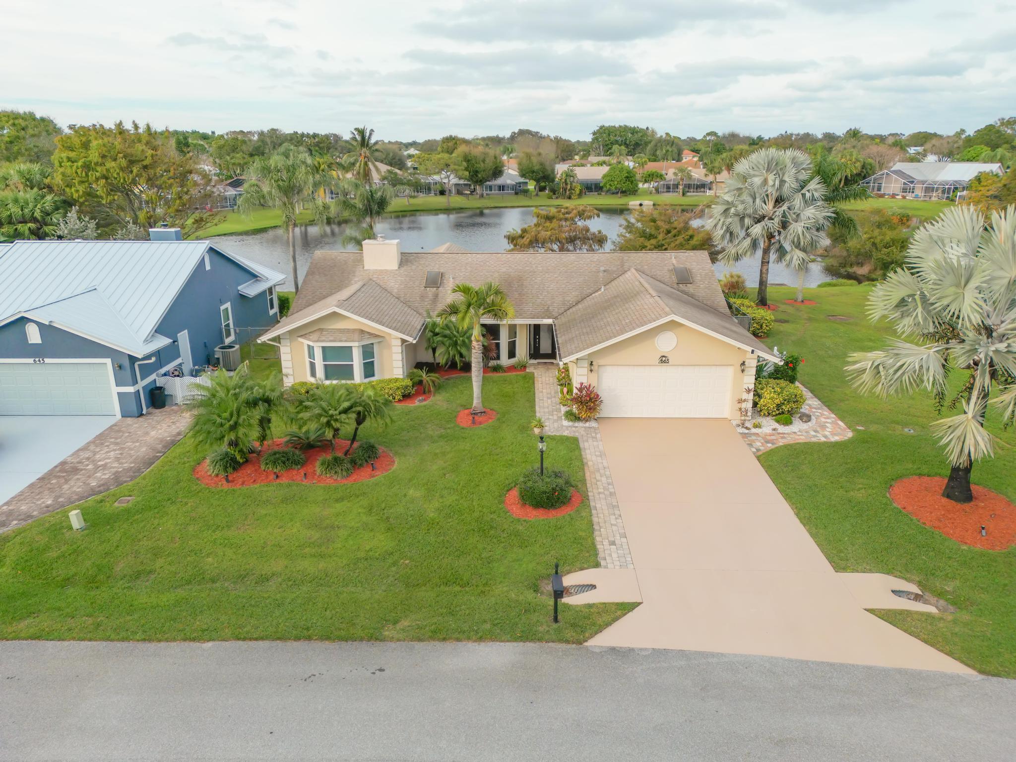 Property Photo: 665 NE Vanda Terrado FL 34957