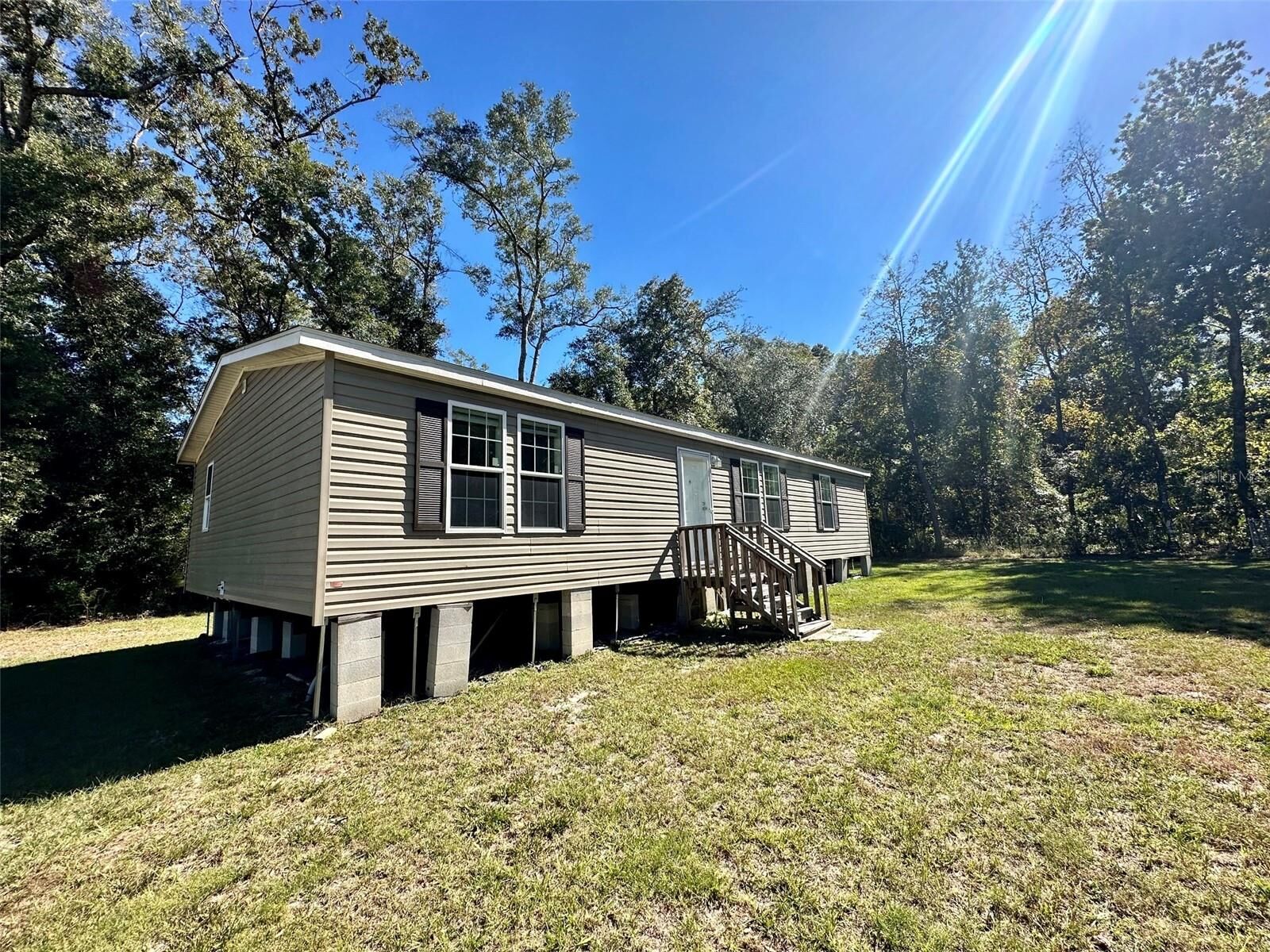 Property Photo:  11070 NW 112th Place  FL 32626