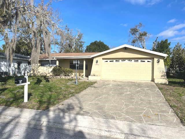 Property Photo:  7819 Cayuga Drive  FL 34653 