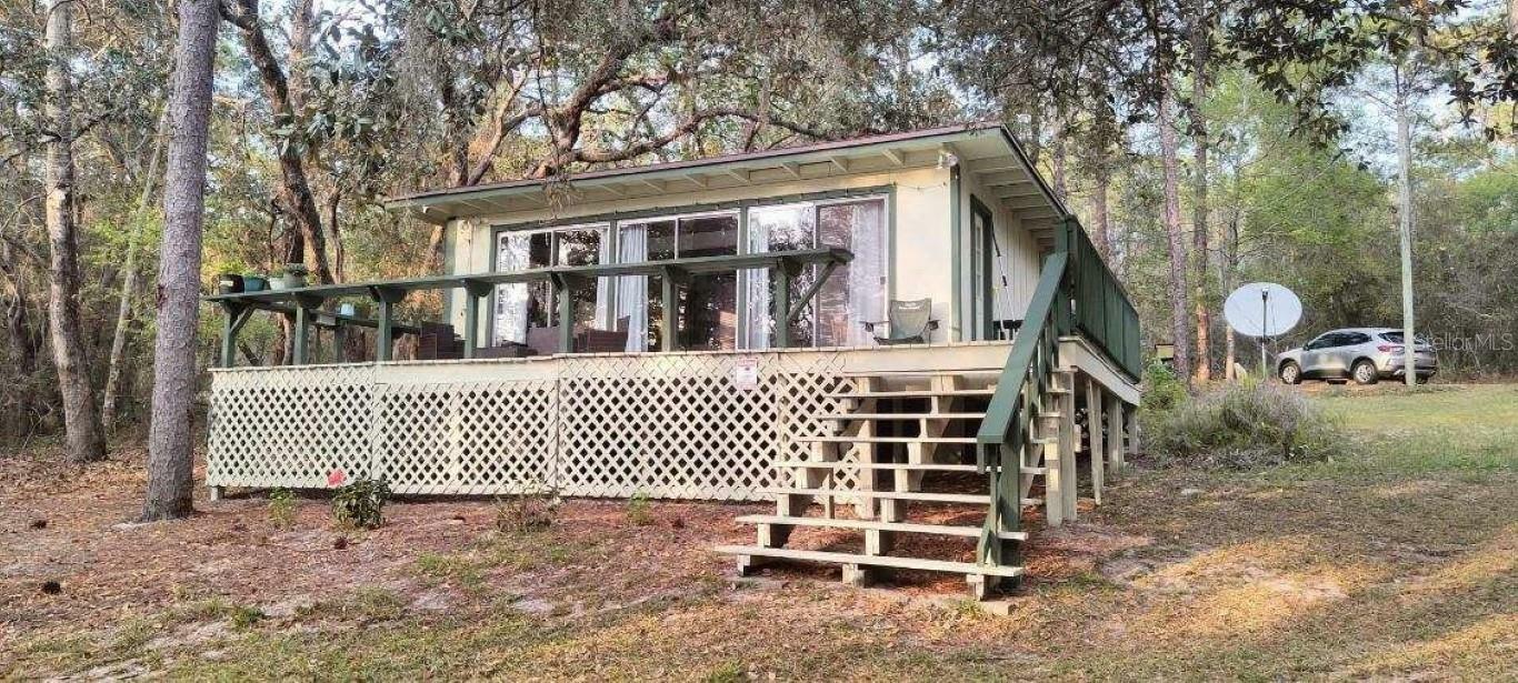 Property Photo:  15330 SE 55th Place Road  FL 32179 