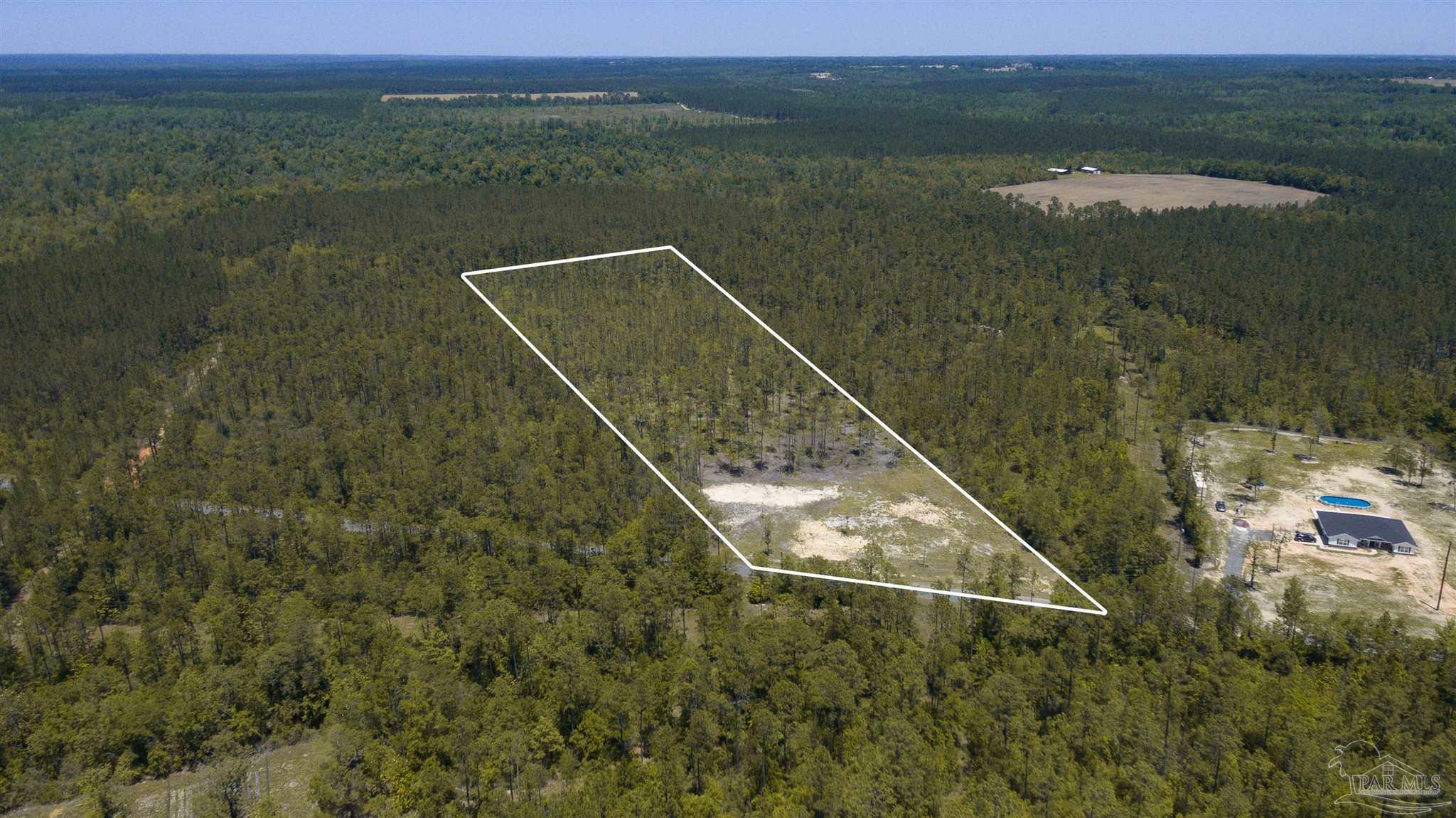 Property Photo:  10354 Chumuckla Springs Rd  FL 32565 