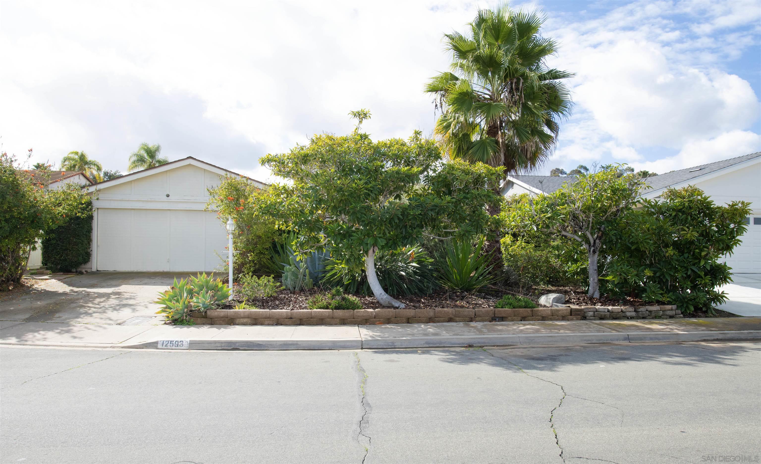 Property Photo: 12593 Lomica Dr CA 92128