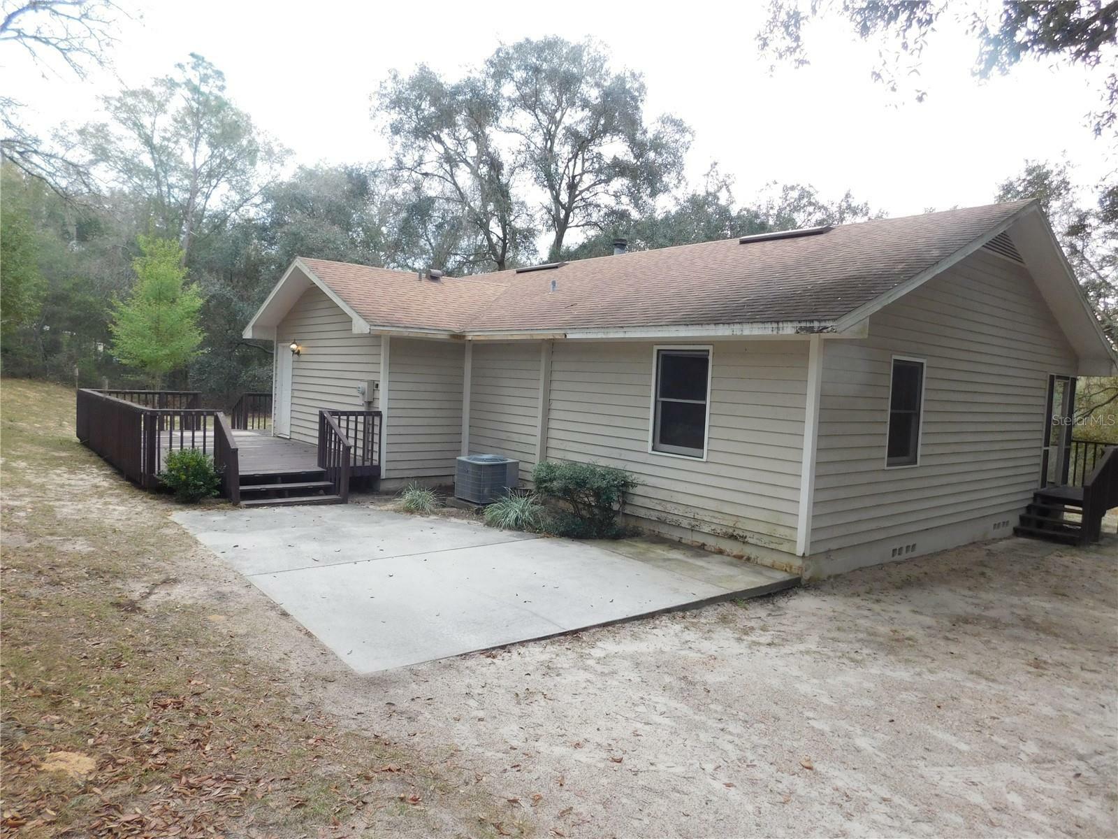 Property Photo:  8229 State Road 100  FL 32656 