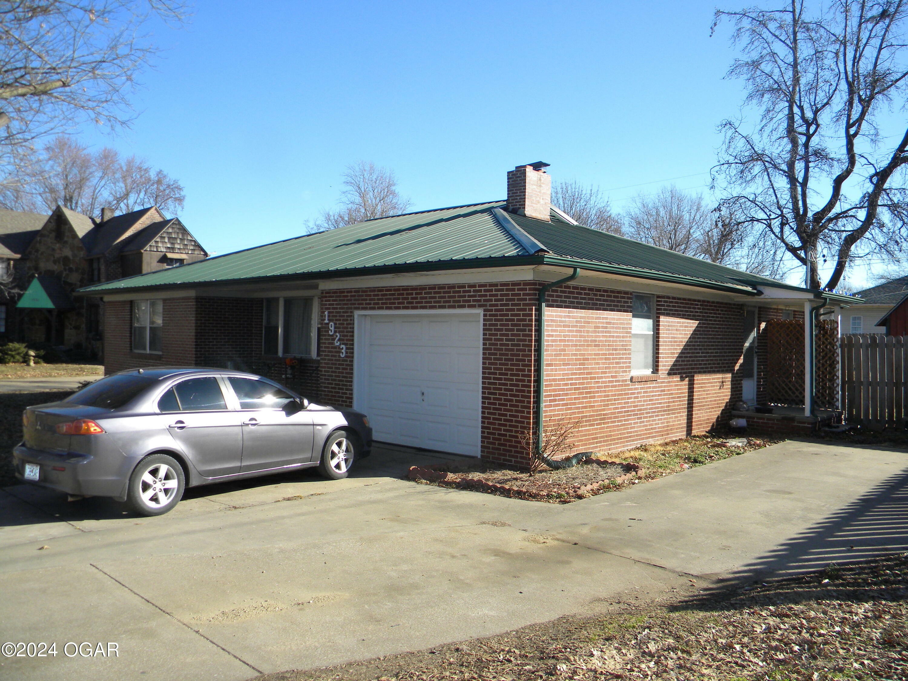 Property Photo:  1923 S Harlem Ave. Avenue  MO 64804 