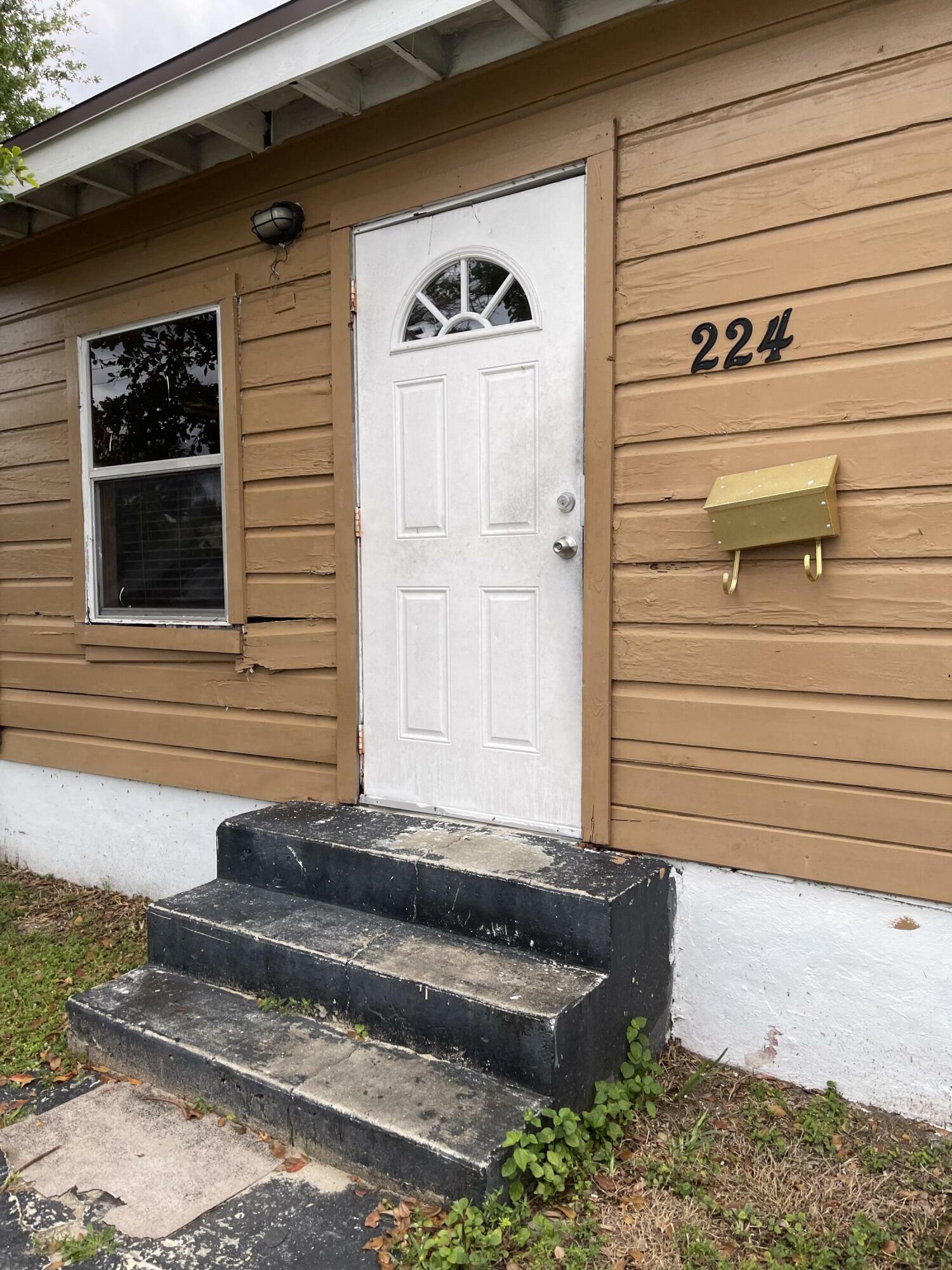 Property Photo:  224 NW 4th Avenue  FL 33444 