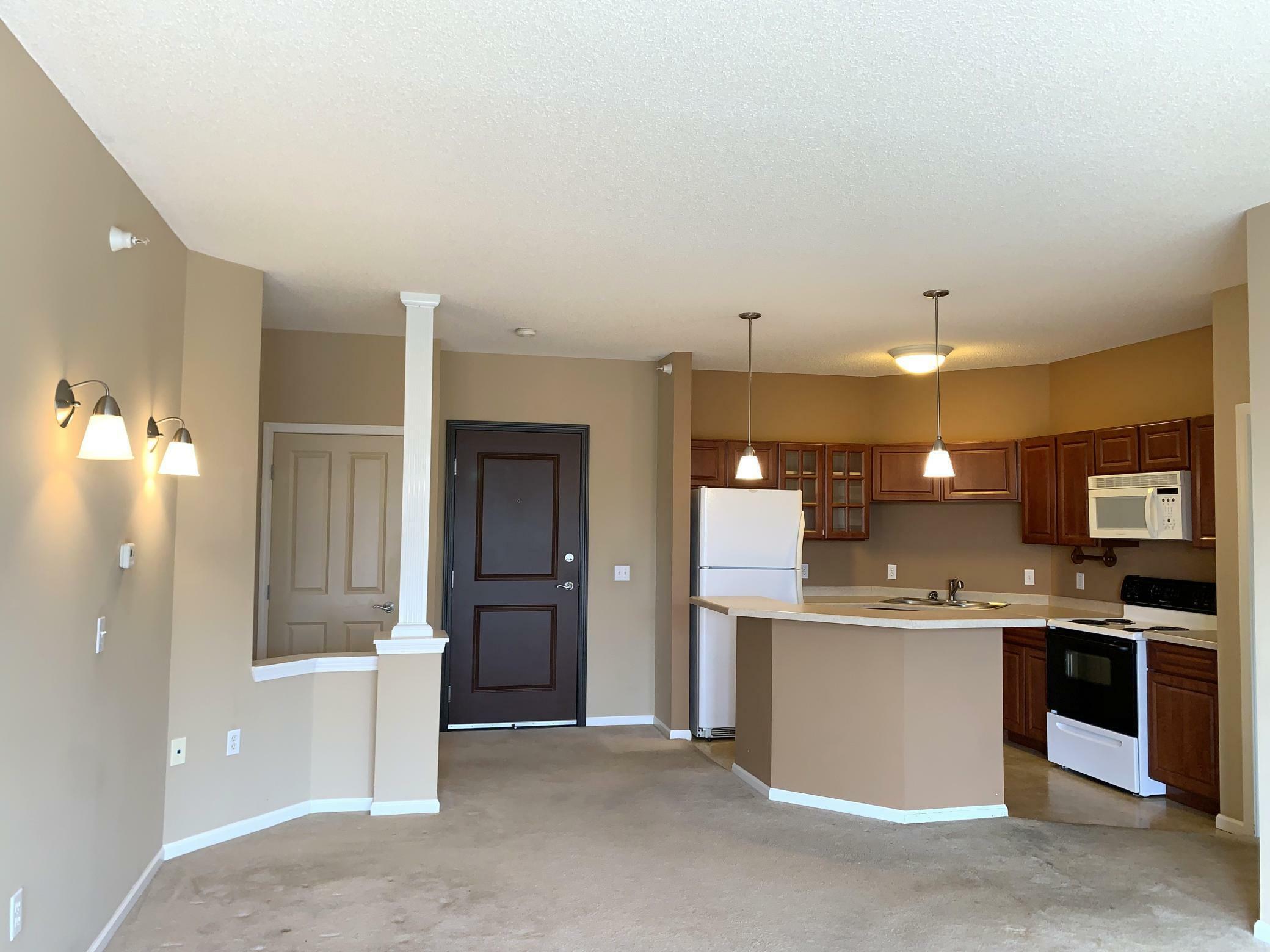 Property Photo:  649 Old Highway 8 NW Apt 237  MN 55112 