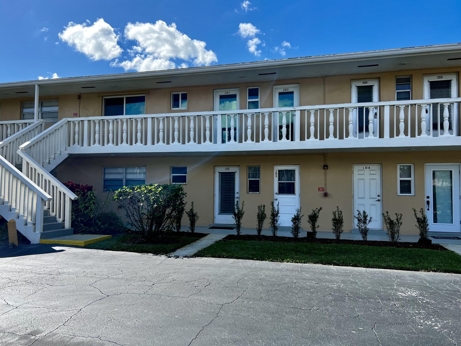 Property Photo:  2222 NE 1st Way 103  FL 33435 