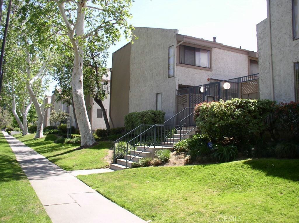 Property Photo:  19540 Sherman Way 405  CA 91335 