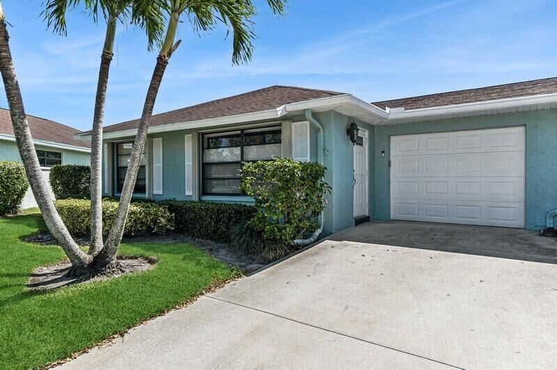 Property Photo:  9855 Tabebuia Tree Drive A  FL 33436 