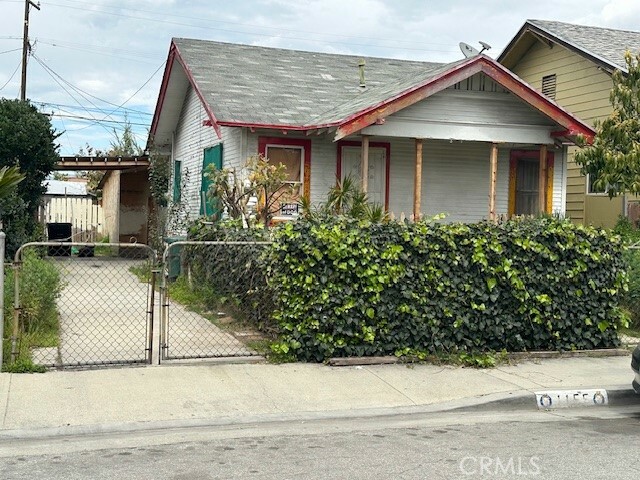 Property Photo:  1155 E 76th Place  CA 90001 