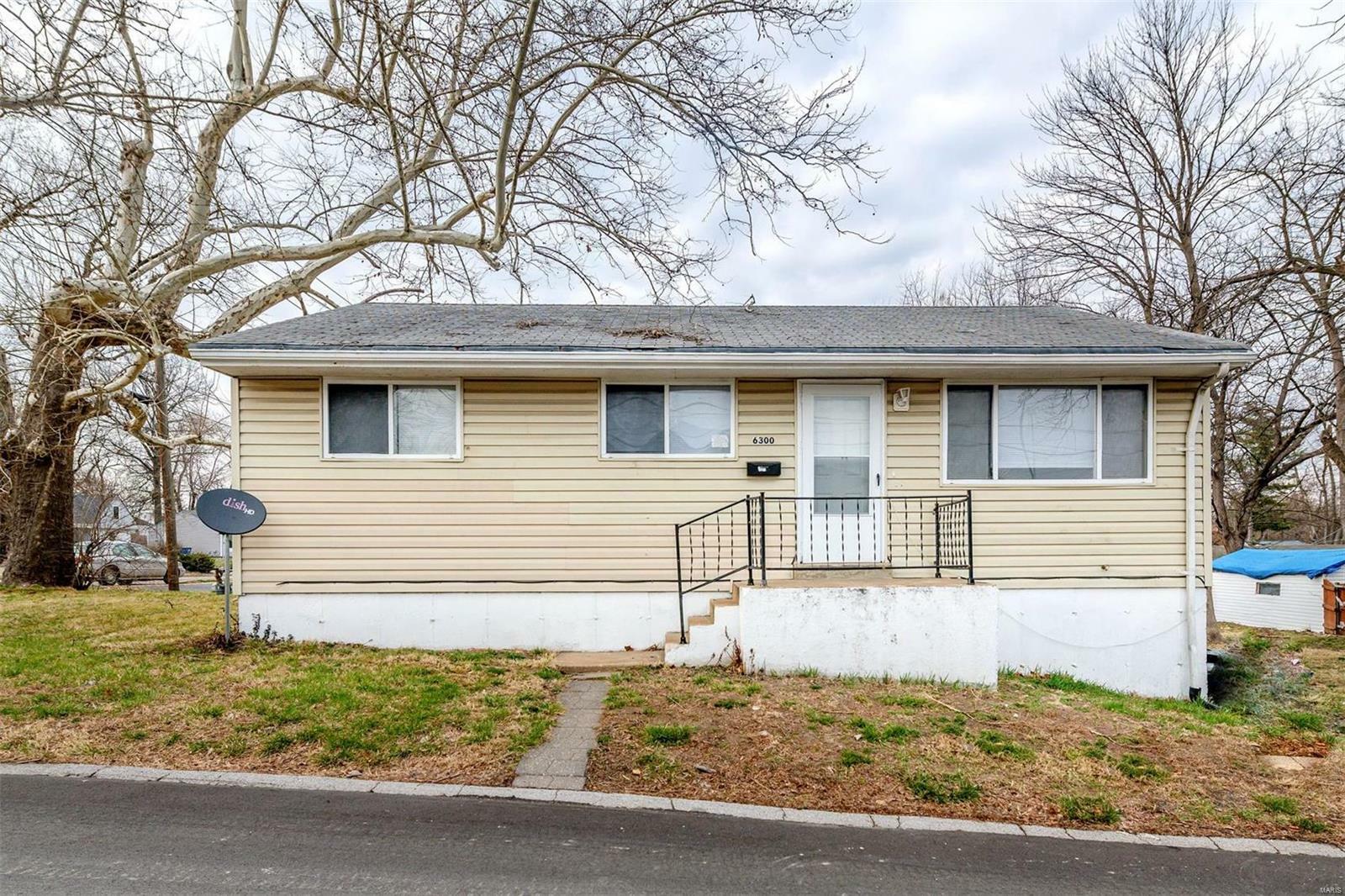 Property Photo:  6300 Evergreen Boulevard  MO 63134 