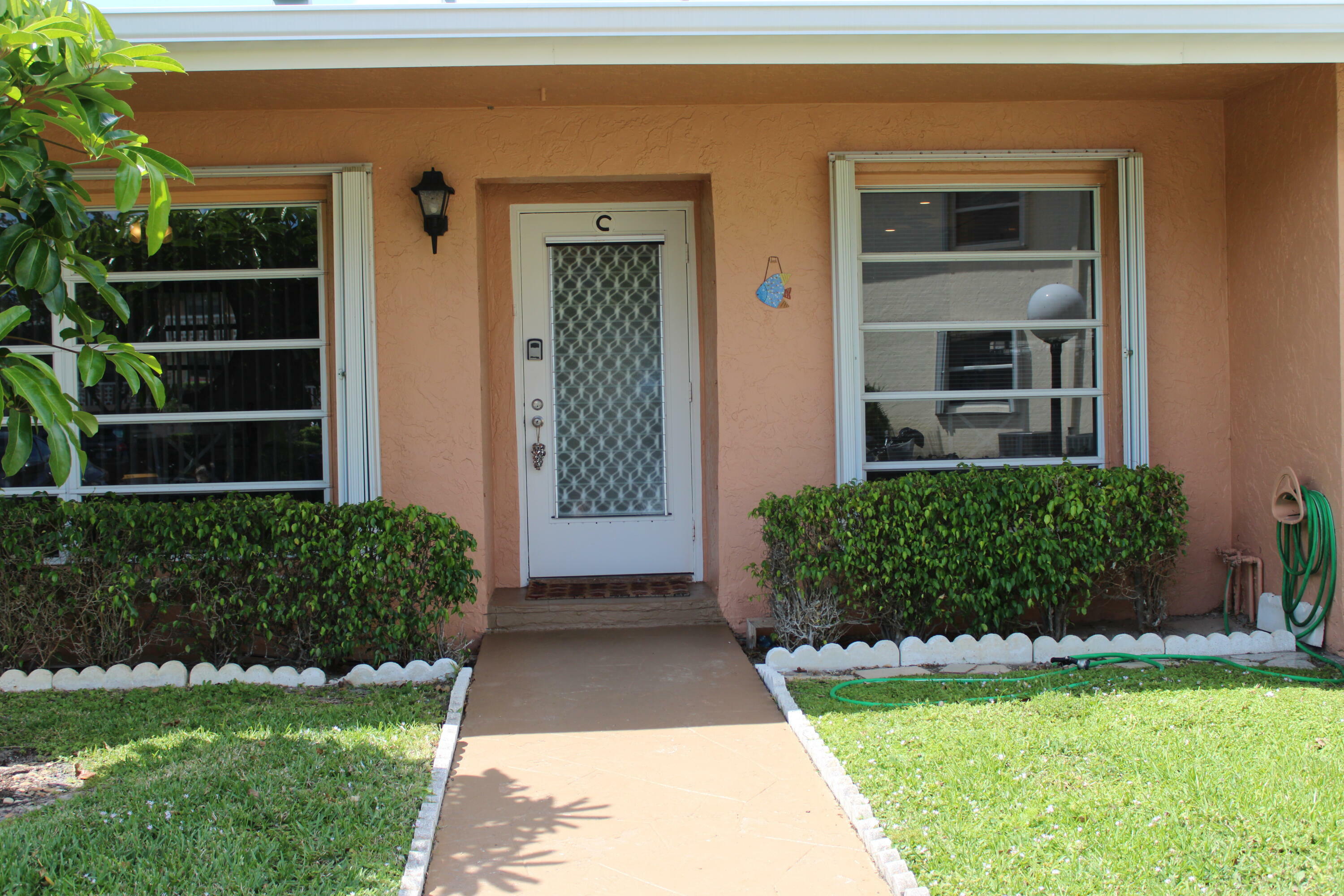 Property Photo:  1700 NW 18th Avenue 48-C  FL 33445 