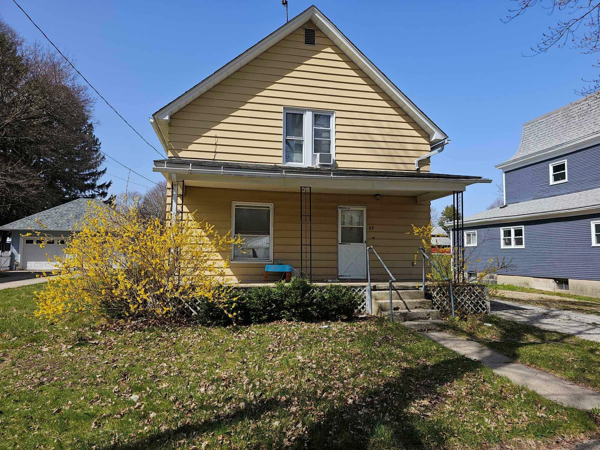 Property Photo:  49 Arthur Street  MI 49327 