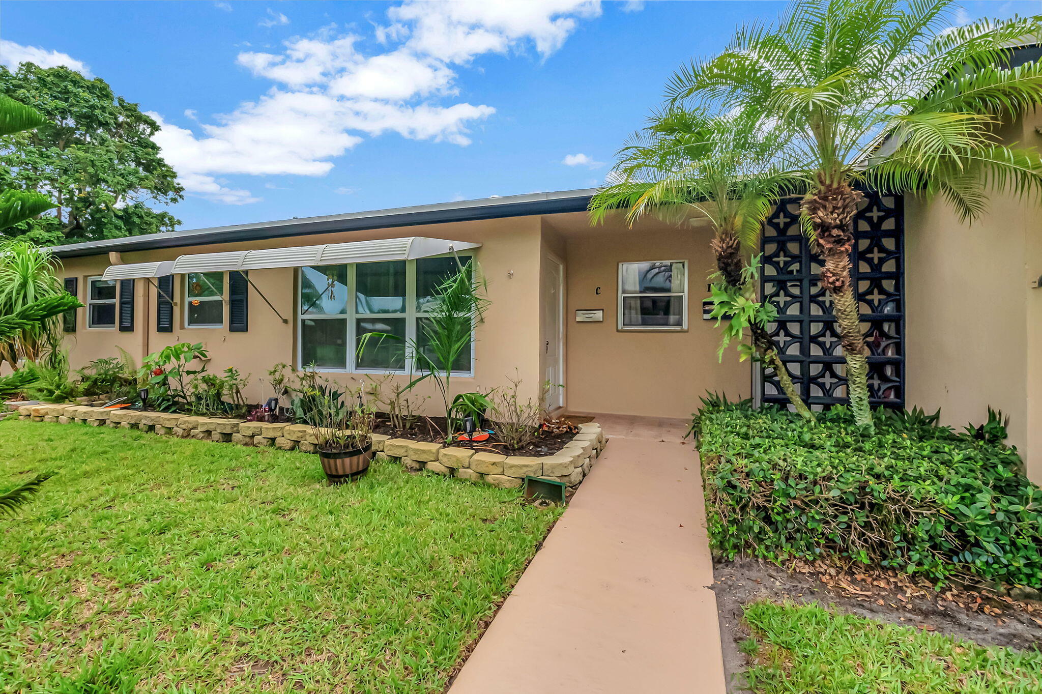 Property Photo:  1040 North Drive C  FL 33445 