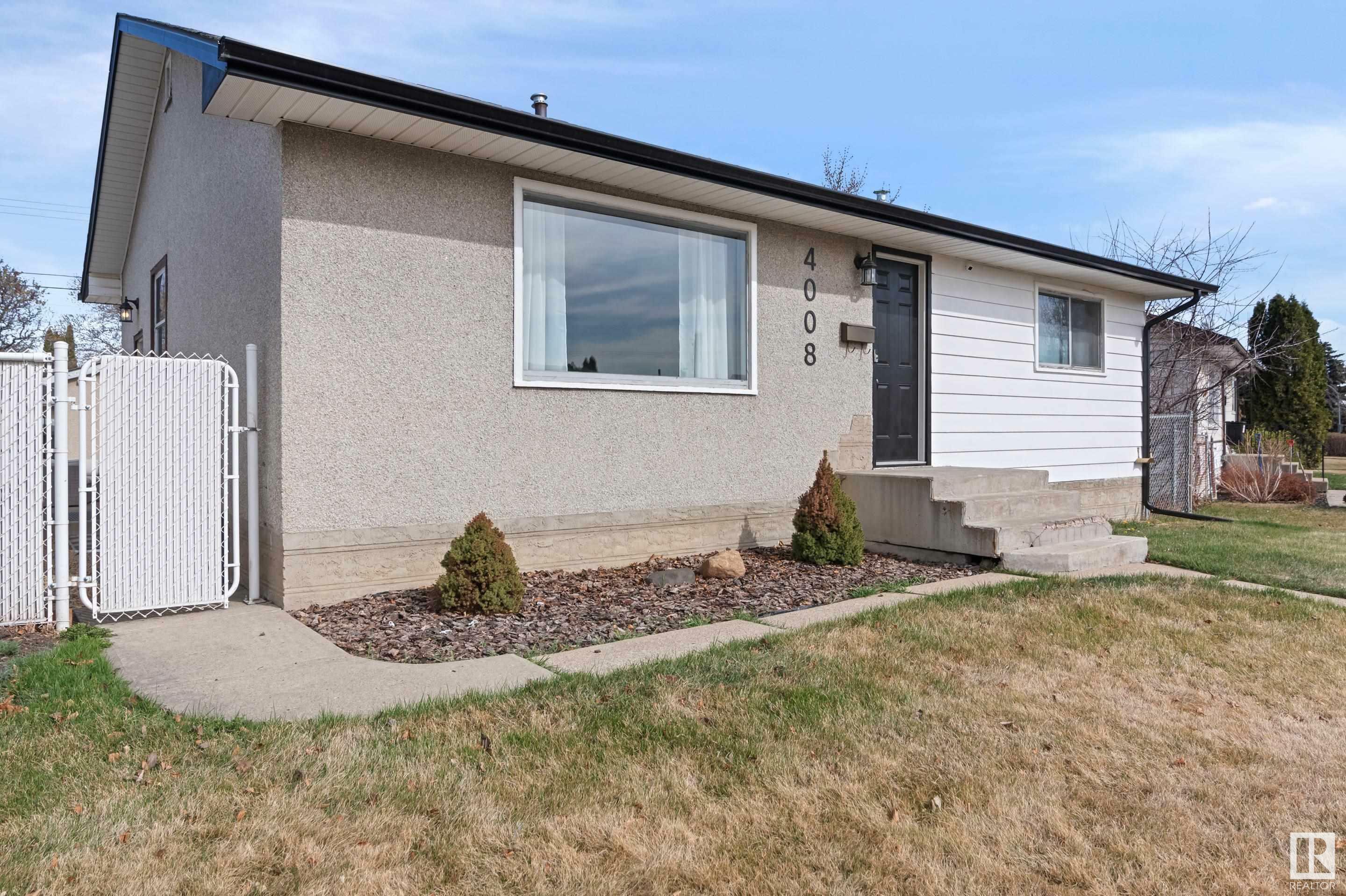 Property Photo:  4008 105 Avenue NW  AB T6A 0Z9 