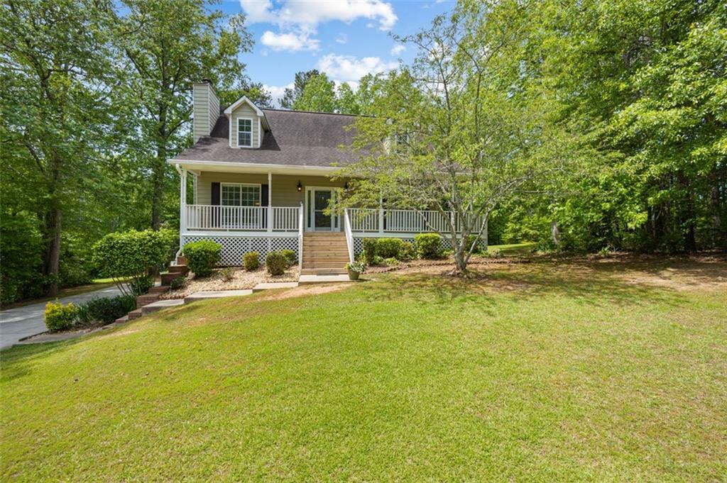 Property Photo:  8627 Foxridge Drive  GA 30187 