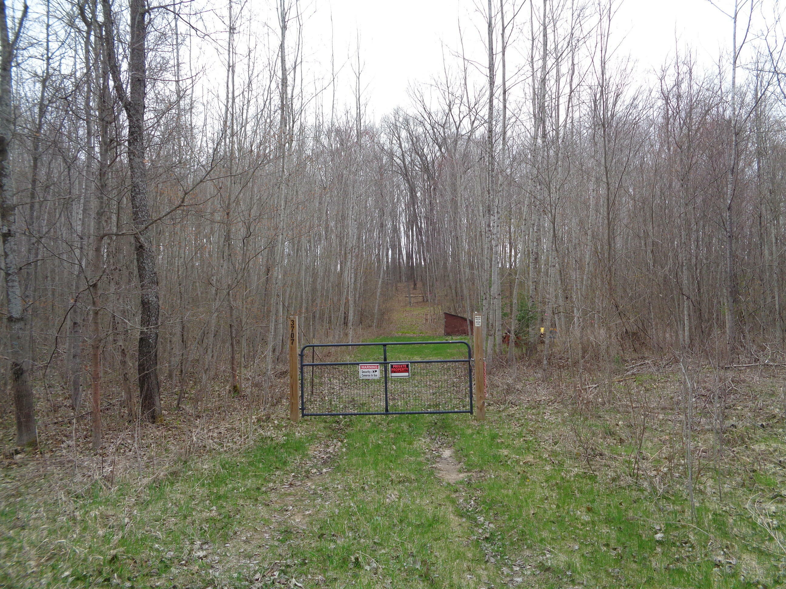 Property Photo:  3687 East Wissmiller Road  MI 48738 