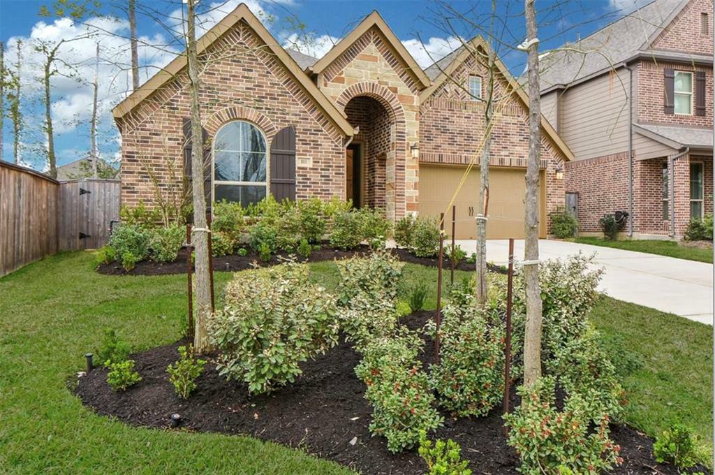 Property Photo:  103 Wild Garden Court  TX 77304 