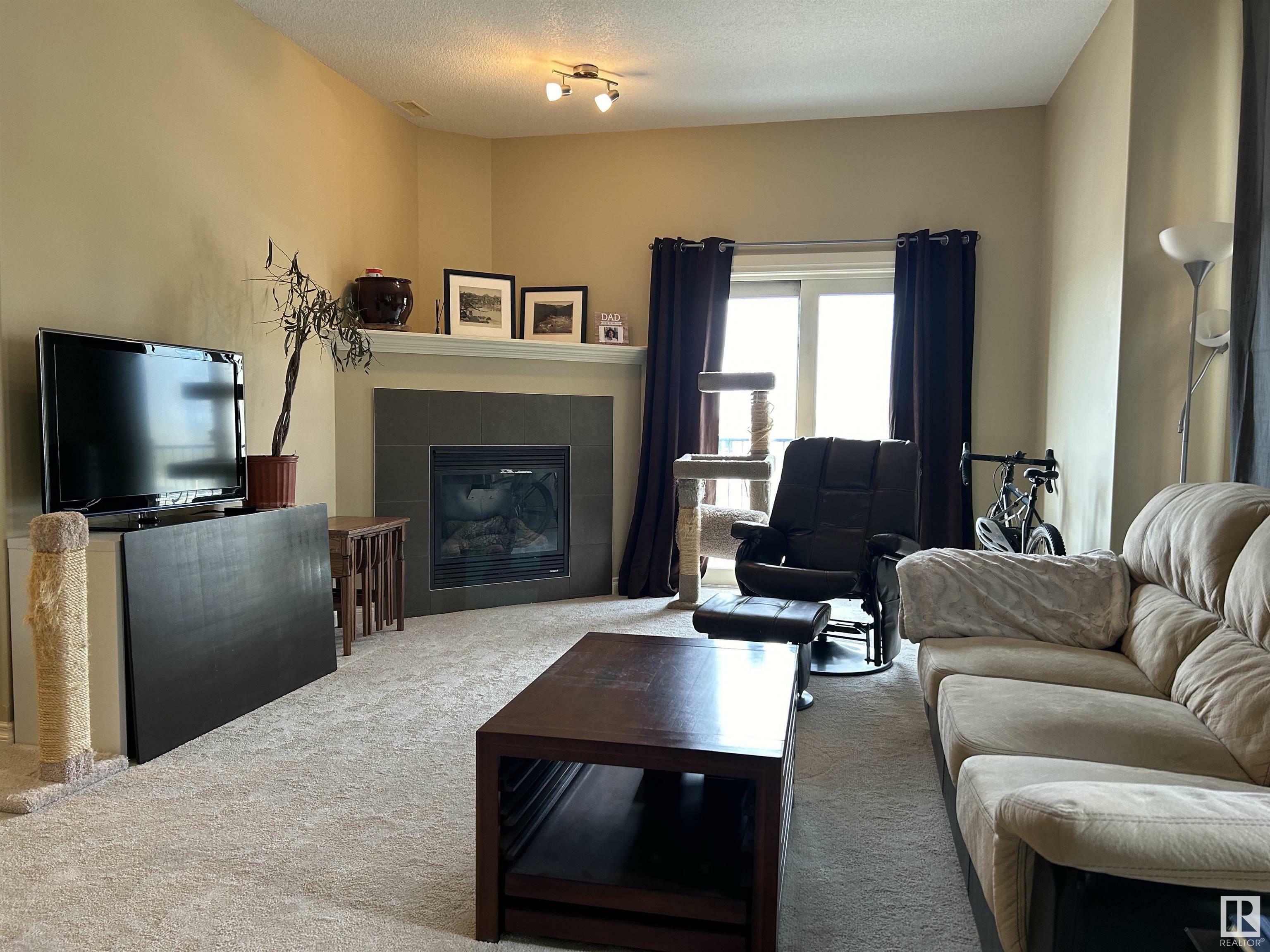 Property Photo:  209 10625 Kingsway NW  AB T5G 2Z6 