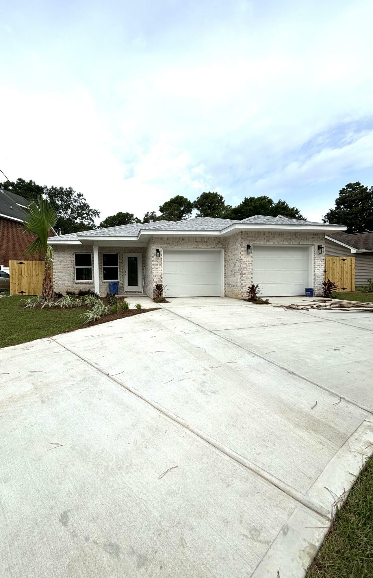 Property Photo:  107 NE Opp Boulevard  FL 32548 