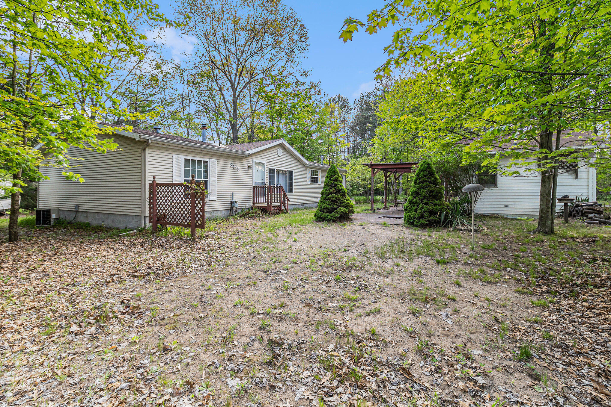 Property Photo:  8175 W Lumberjack Drive  MI 49436 