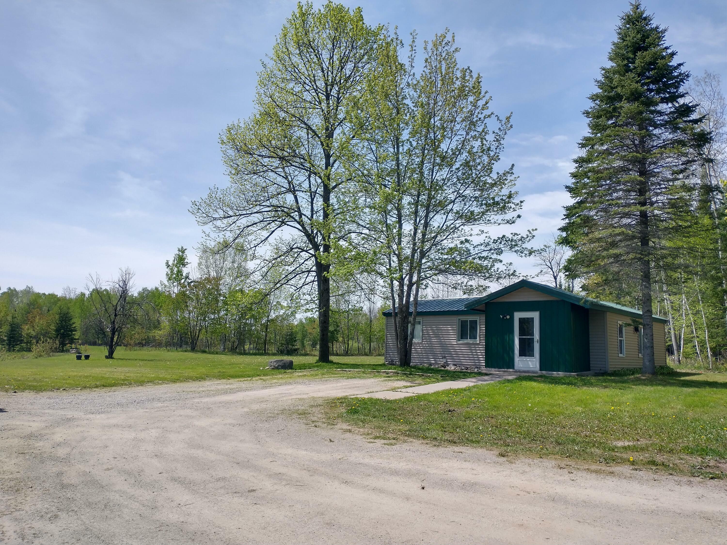 Property Photo:  8967 Montgomery Road  MI 49705 