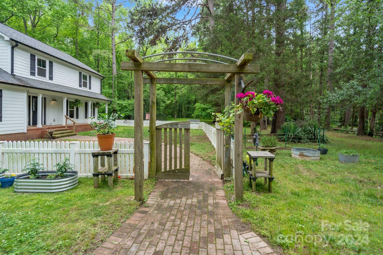 Property Photo:  15016 Rocky River Road  NC 28036 