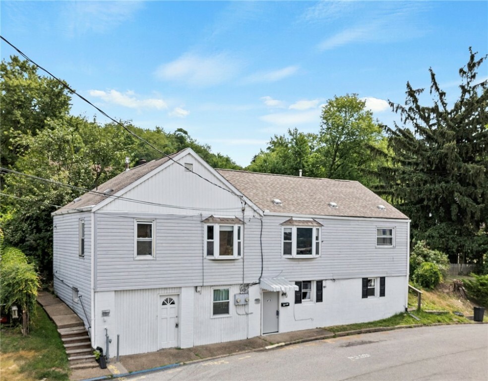 Property Photo:  1211 4th Ave  PA 15042 