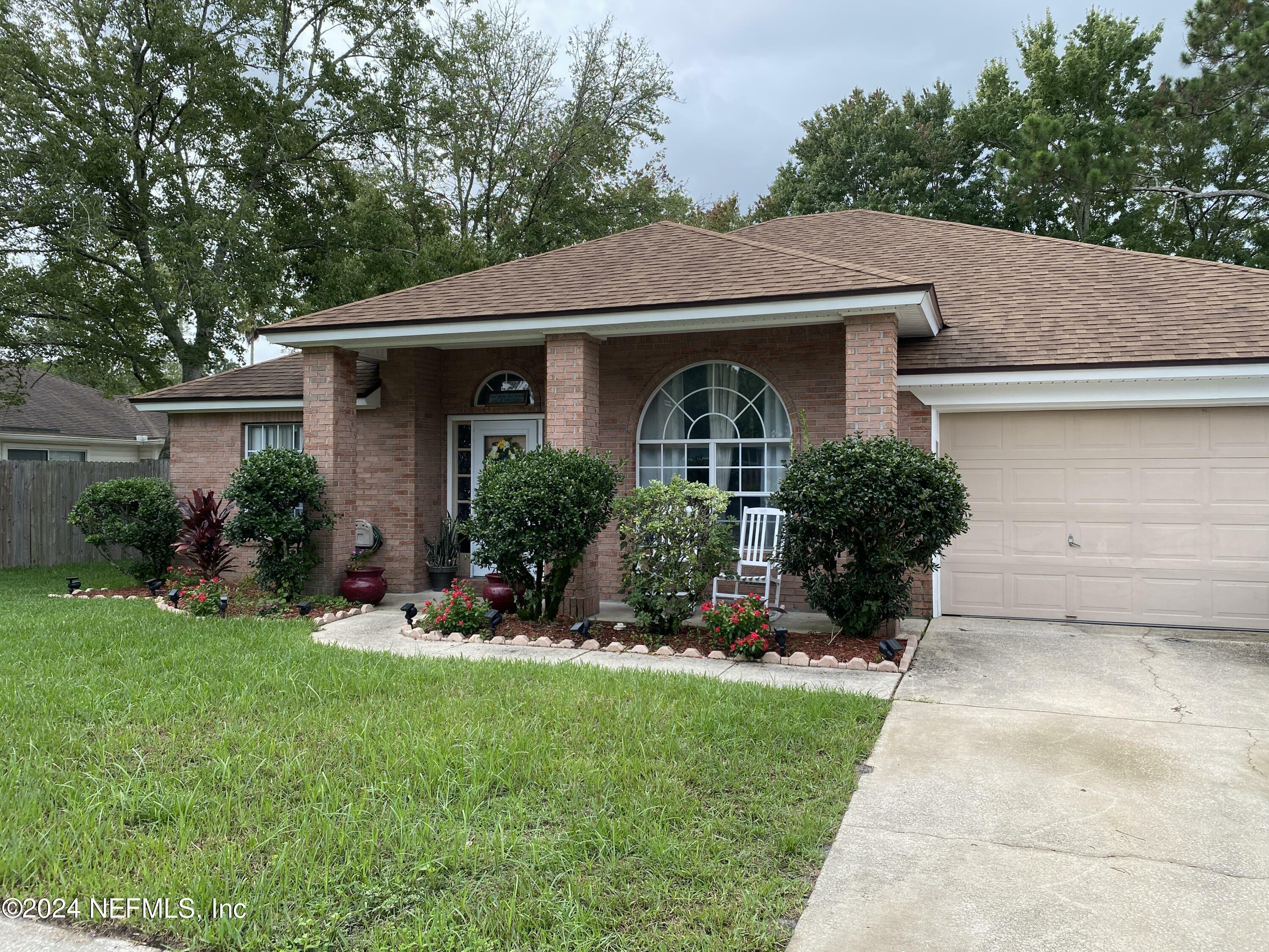 Property Photo:  8930 Needlepoint Place  FL 32244 