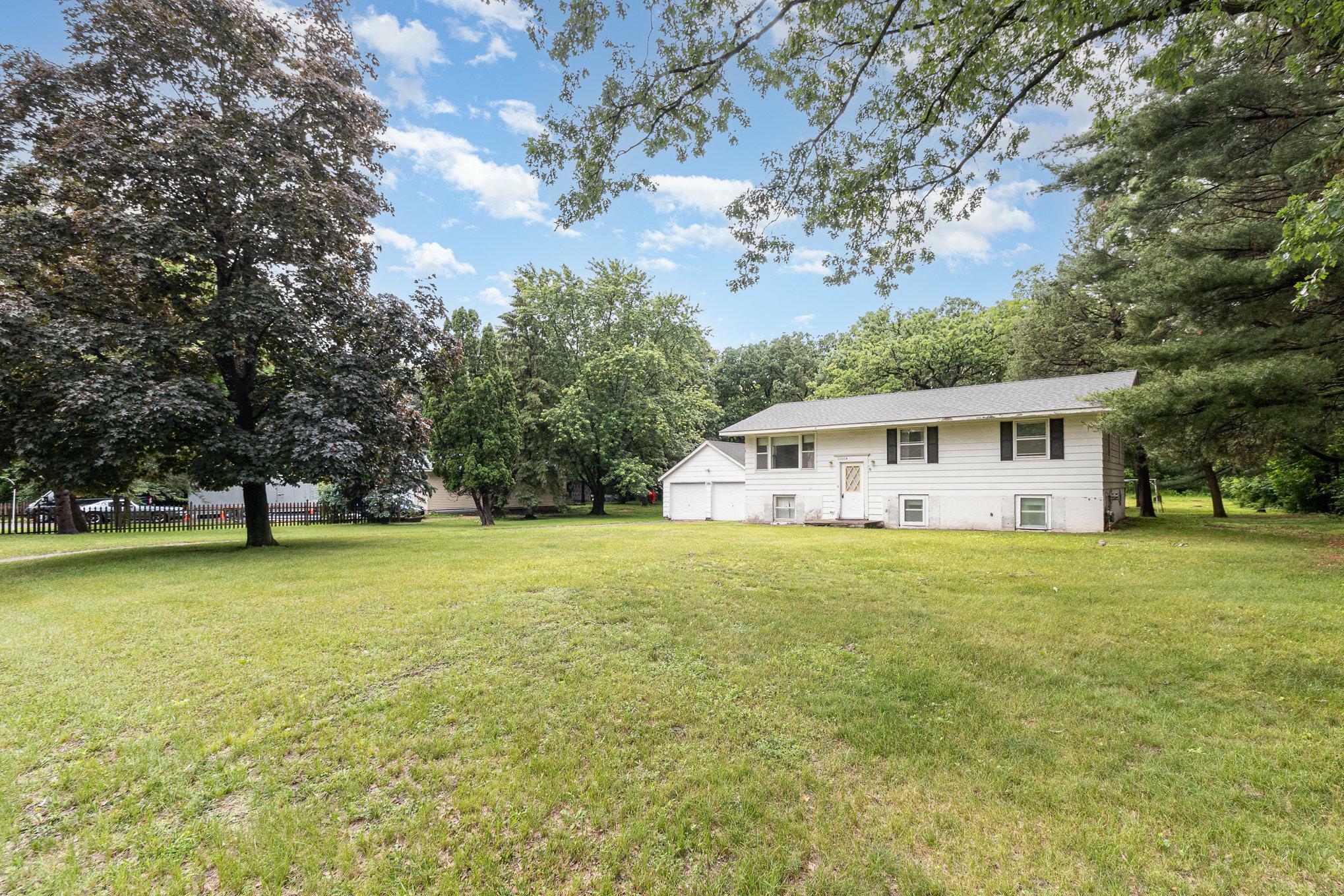 Property Photo: 10004 Linnet Street NW MN 55433