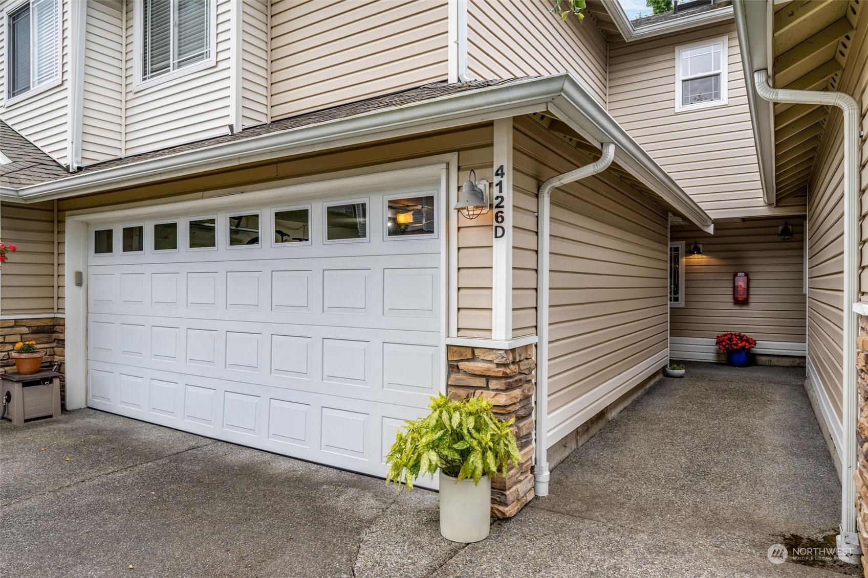 Property Photo:  4126 214th Street SW D  WA 98043 