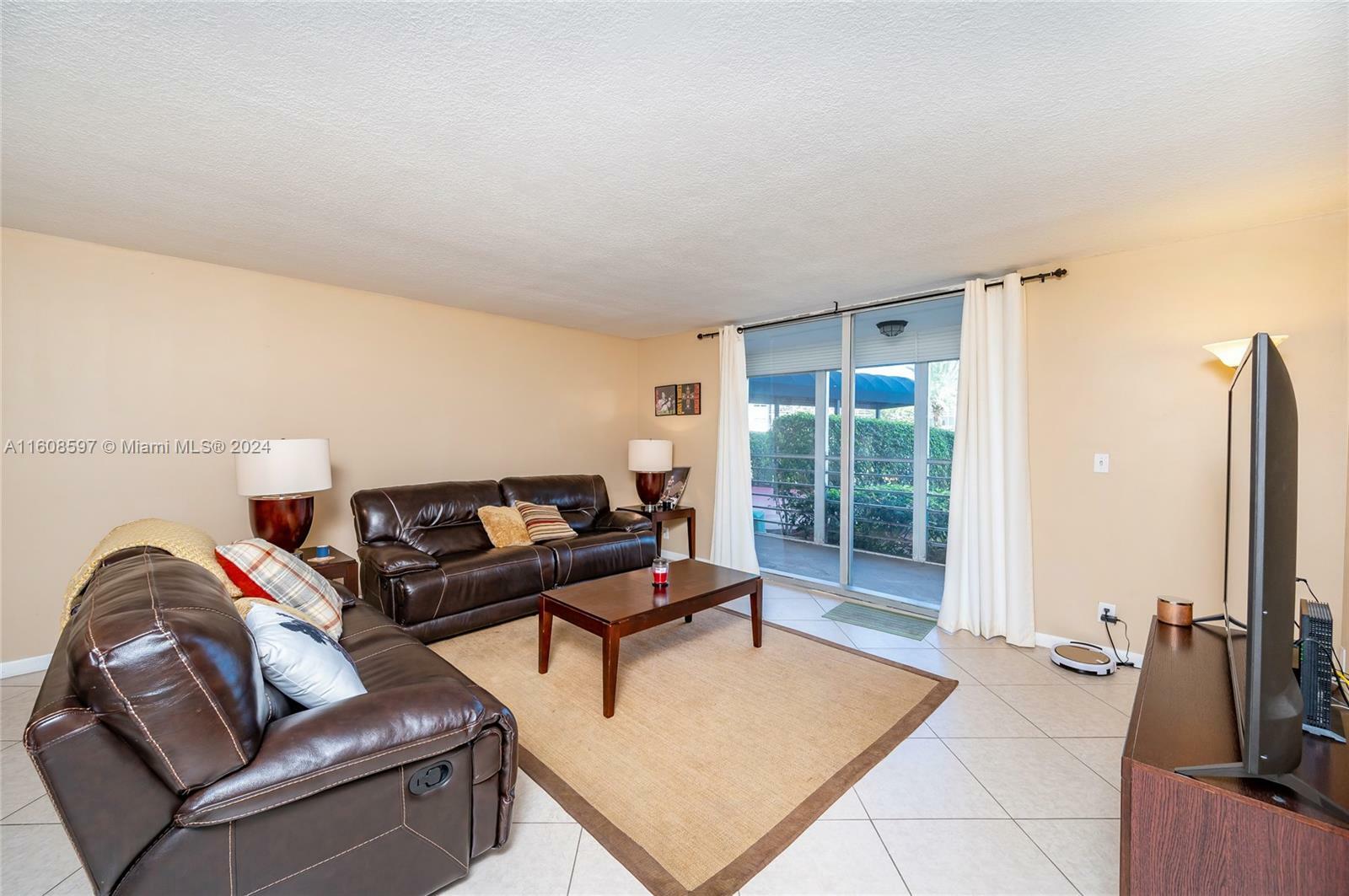 Property Photo:  100 Golden Isles Dr 104  FL 33009 