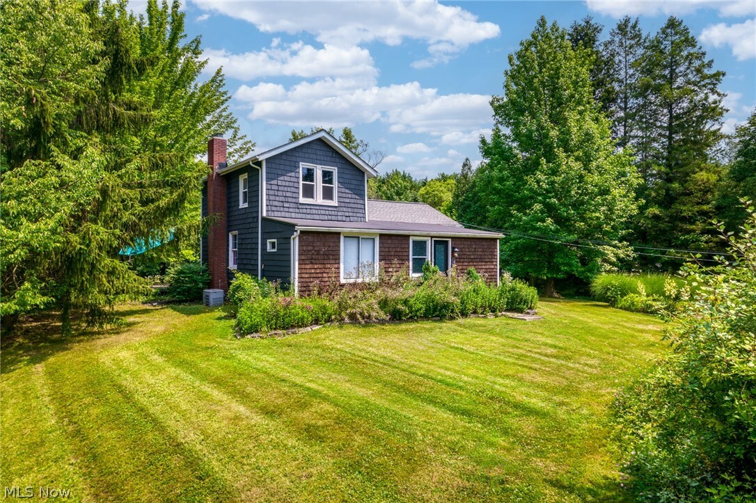 Property Photo:  8318 Bainbridge Road  OH 44023 