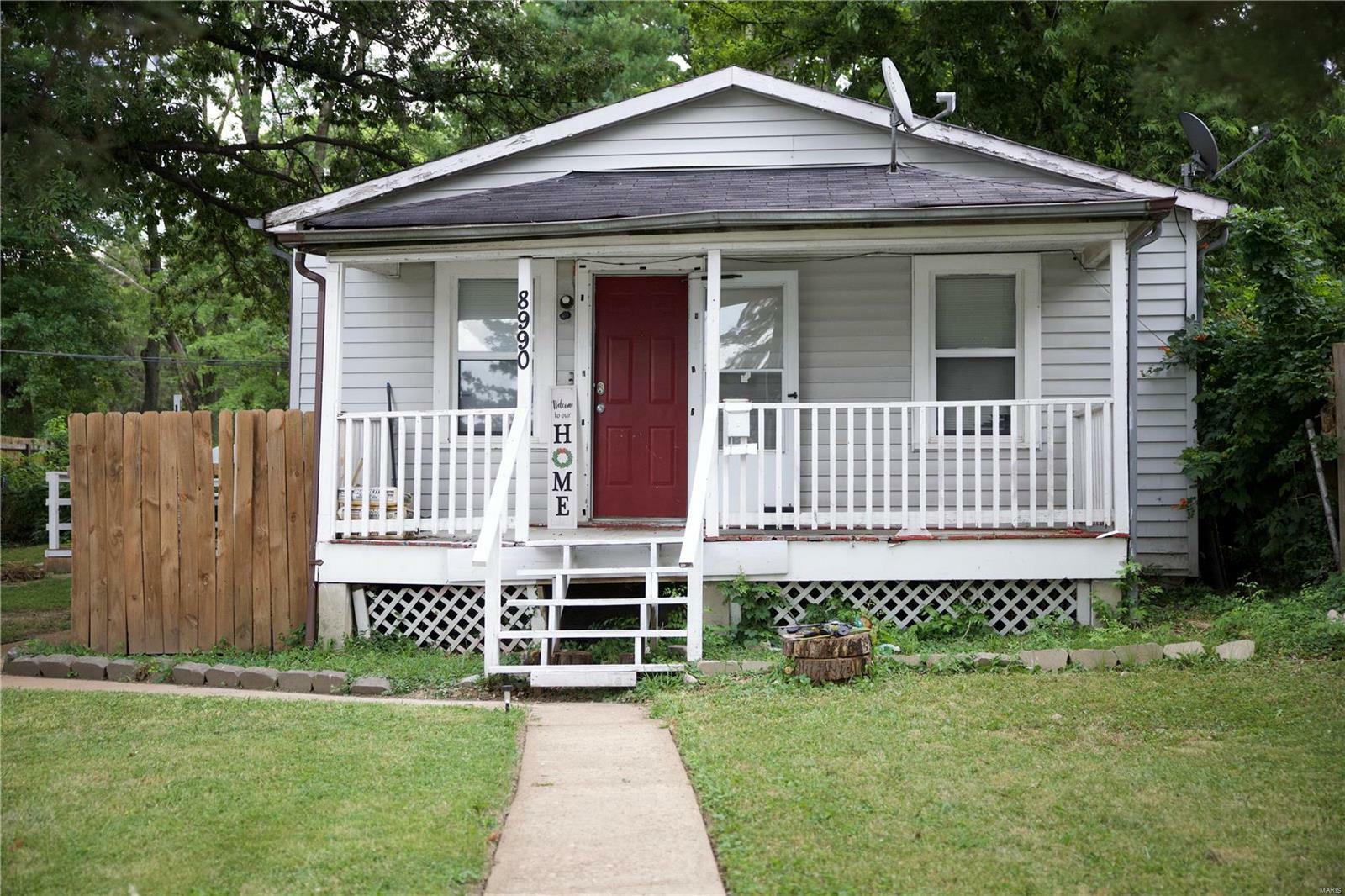 Property Photo:  8990 Edna Street  MO 63147 