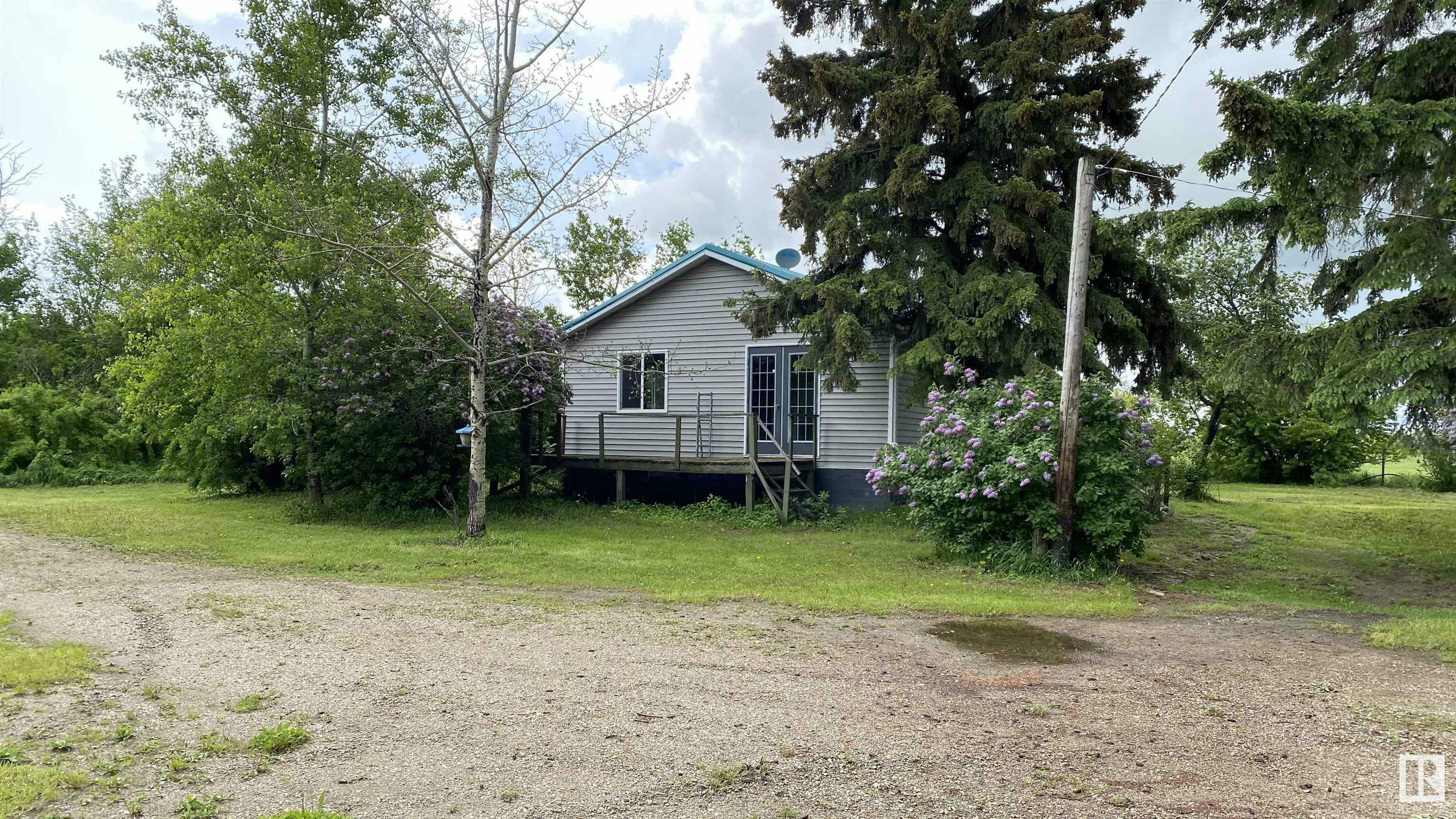 Property Photo:  59310 Rng Rd 112  AB T0A 0C0 