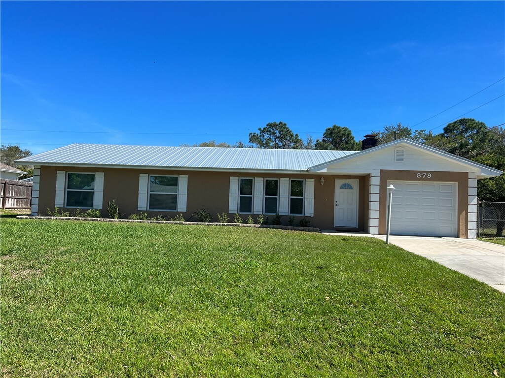 Property Photo:  879 Blossom Drive  FL 32958 