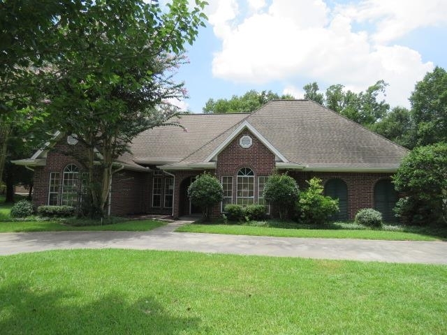 Property Photo:  7840 Woodland Trails  TX 77630-8222 