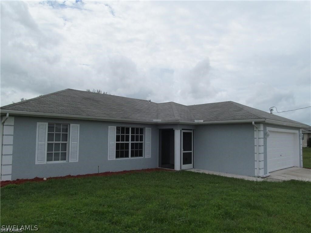 Property Photo:  2223 NW 3rd Avenue  FL 33993 