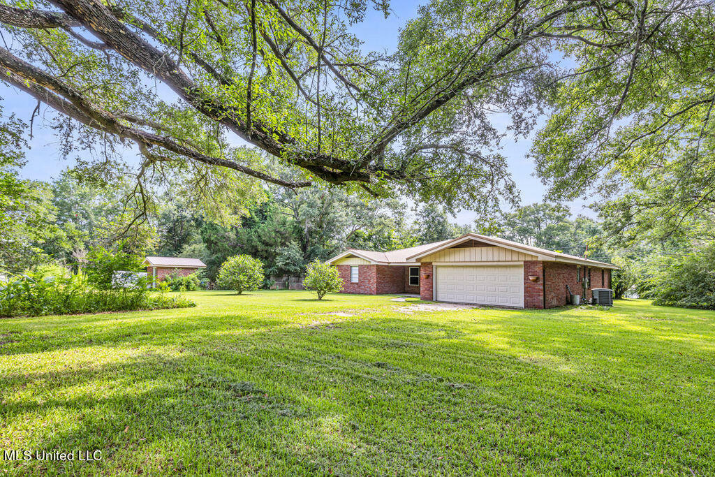 Property Photo:  20332 Red Bird Hill Road  MS 39503 