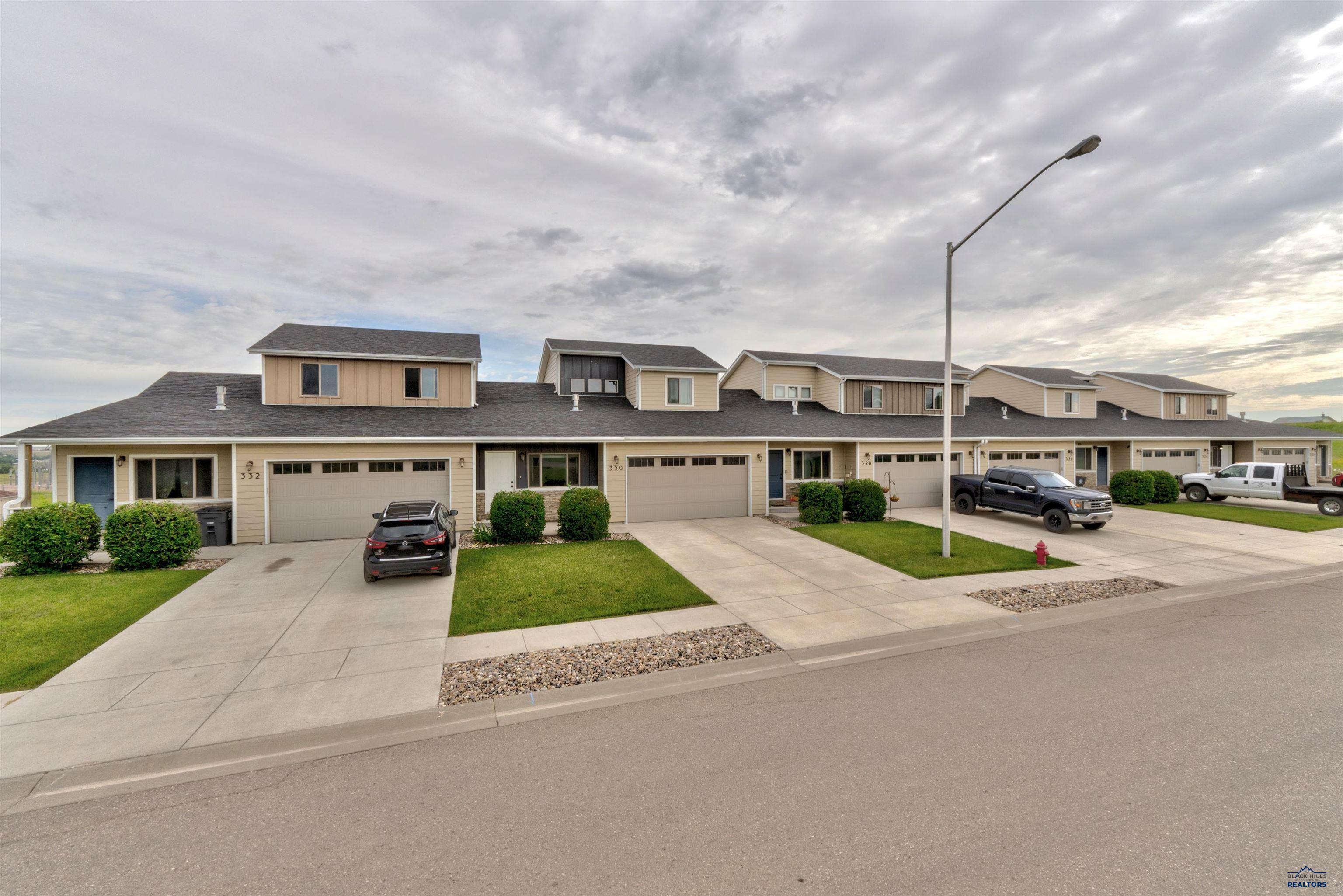 Property Photo:  332,330,328,326 Bear Tooth Dr 324 Bear Tooth Dr  SD 57719 