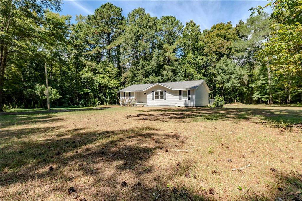 Property Photo:  1085 New Rosedale Road NE  GA 30105 