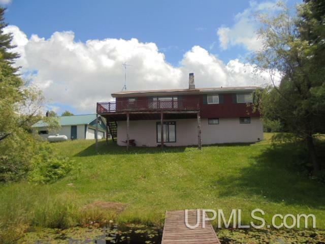 Property Photo:  12415 Elbow Lake Road  MI 49947 