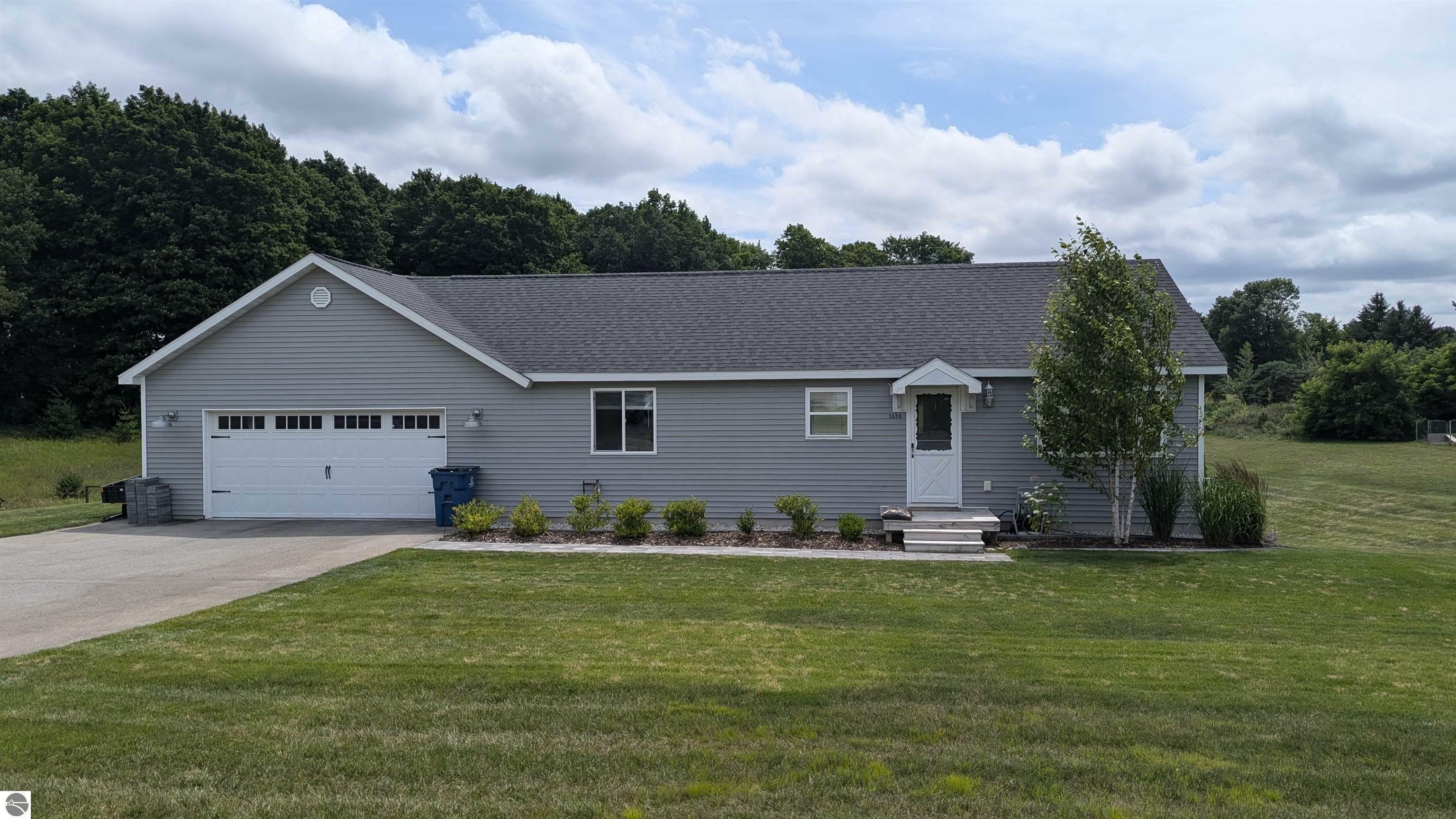 Property Photo:  1636 Yellow Birch Lane  MI 49696 