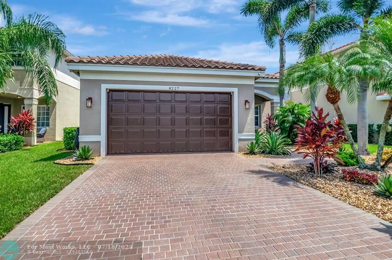 Property Photo:  8227 Calabria Lakes Drive  FL 33473 