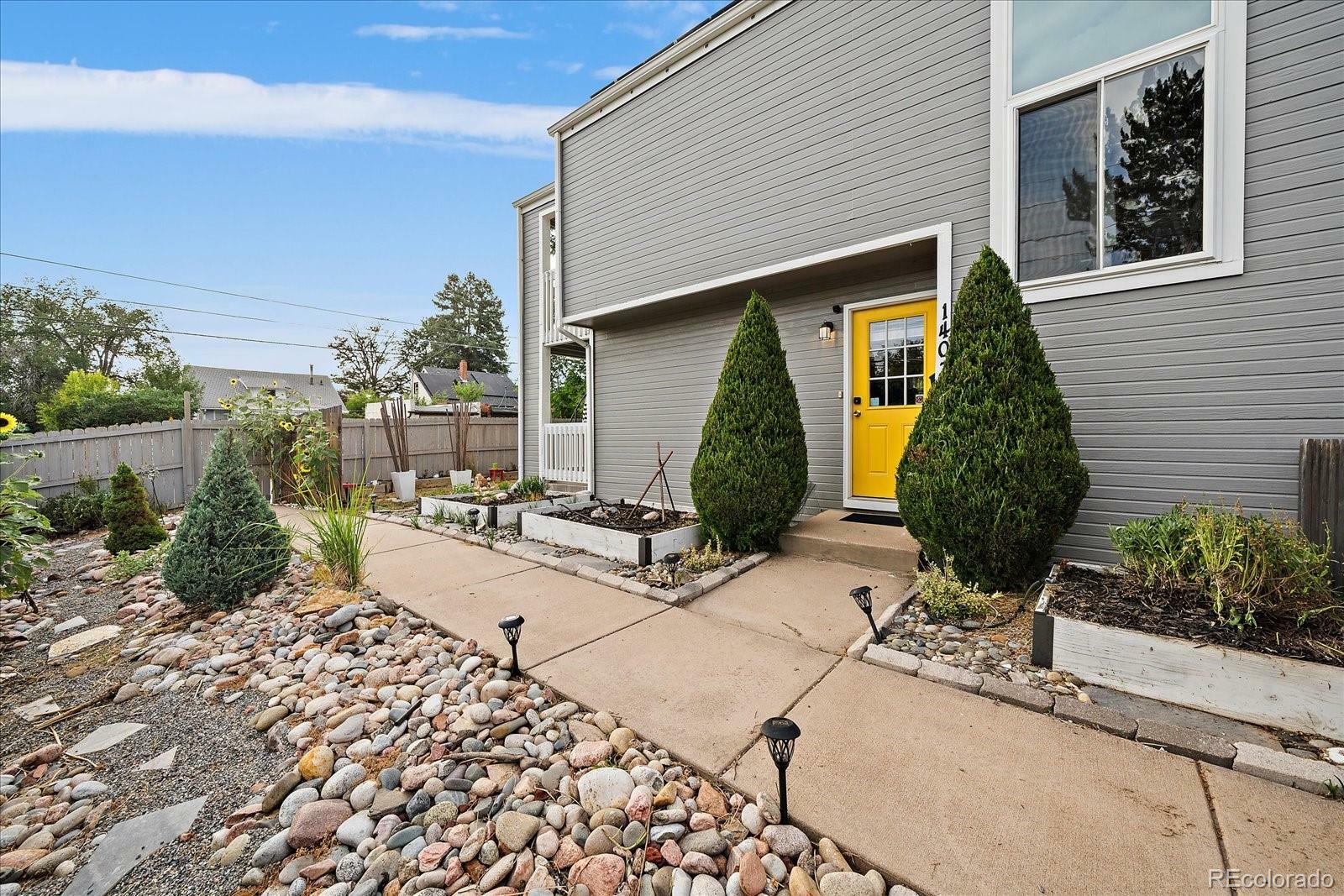 Property Photo:  1403 Valentia Street  CO 80220 