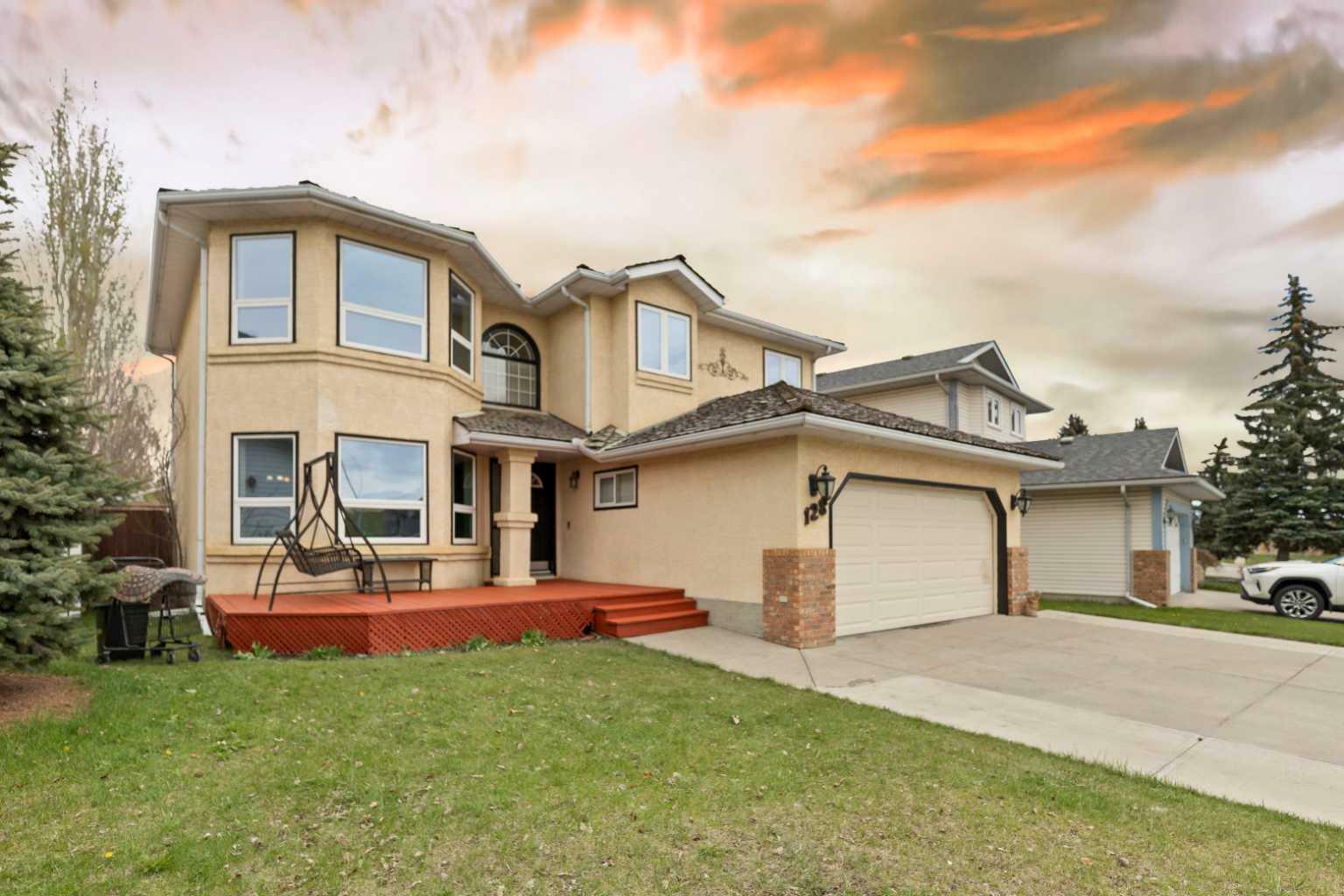 Property Photo:  128 Harvest Hills Drive NE  AB T3K 3X4 