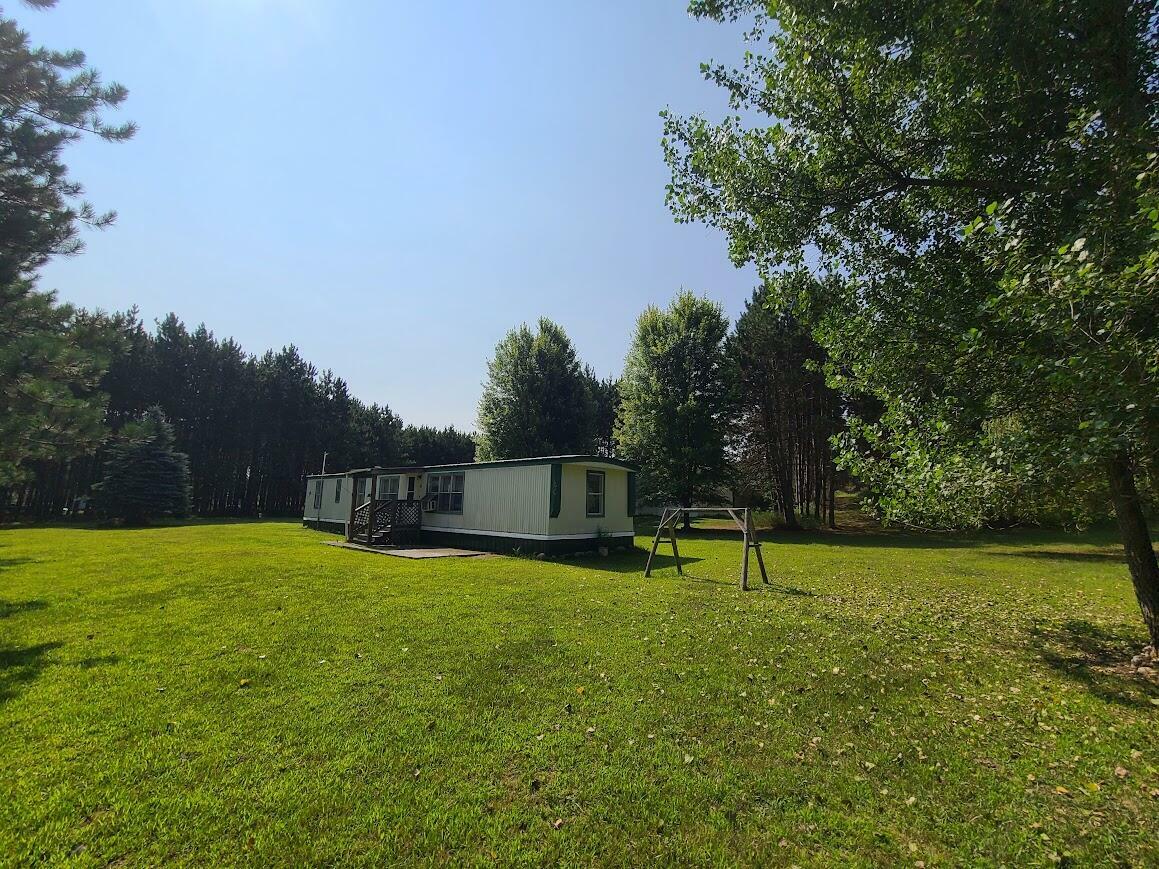 Property Photo:  418 Meceola Court  MI 49639 