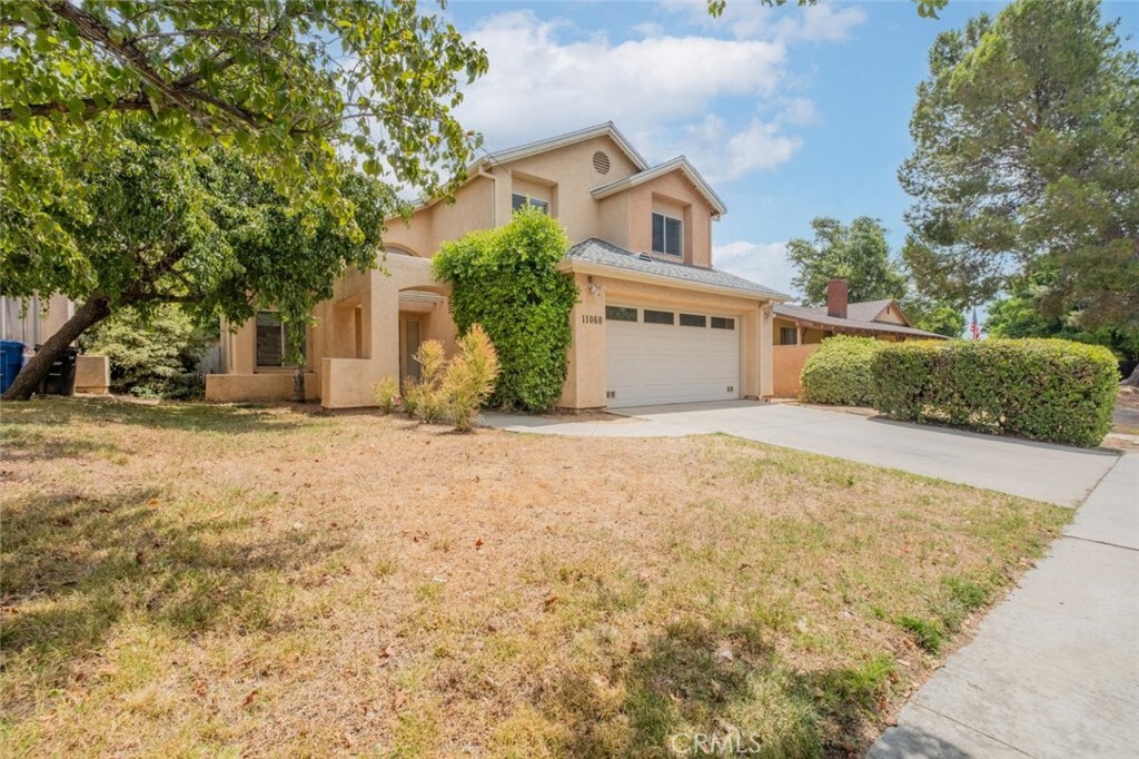 Property Photo:  11060 Sharp Avenue  CA 91345 