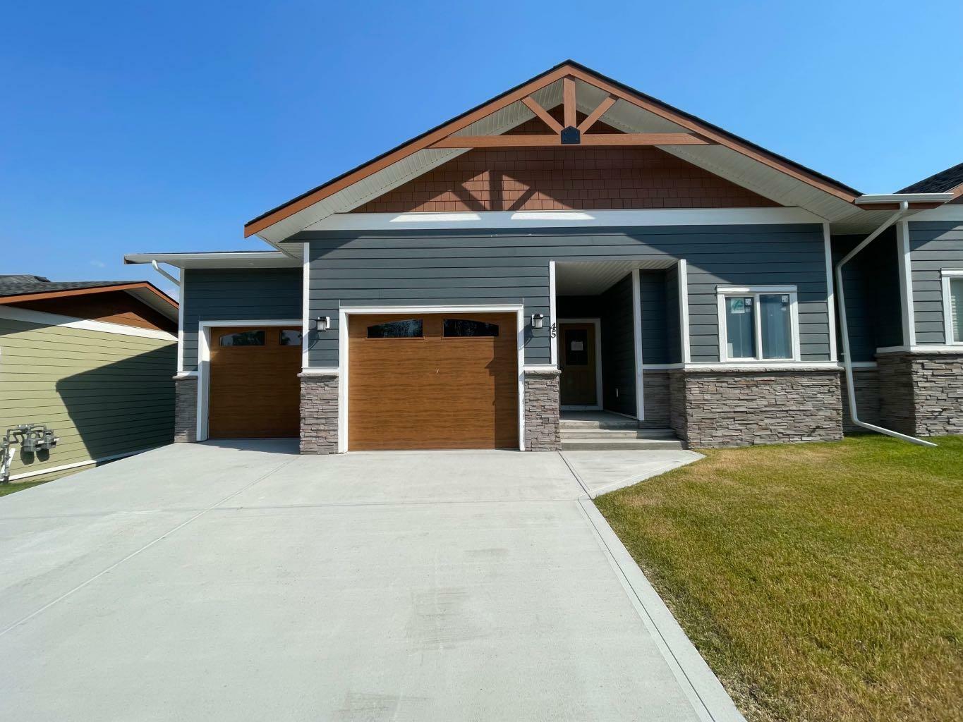 Property Photo:  214 McArdell Drive 45  AB T7V 0A9 