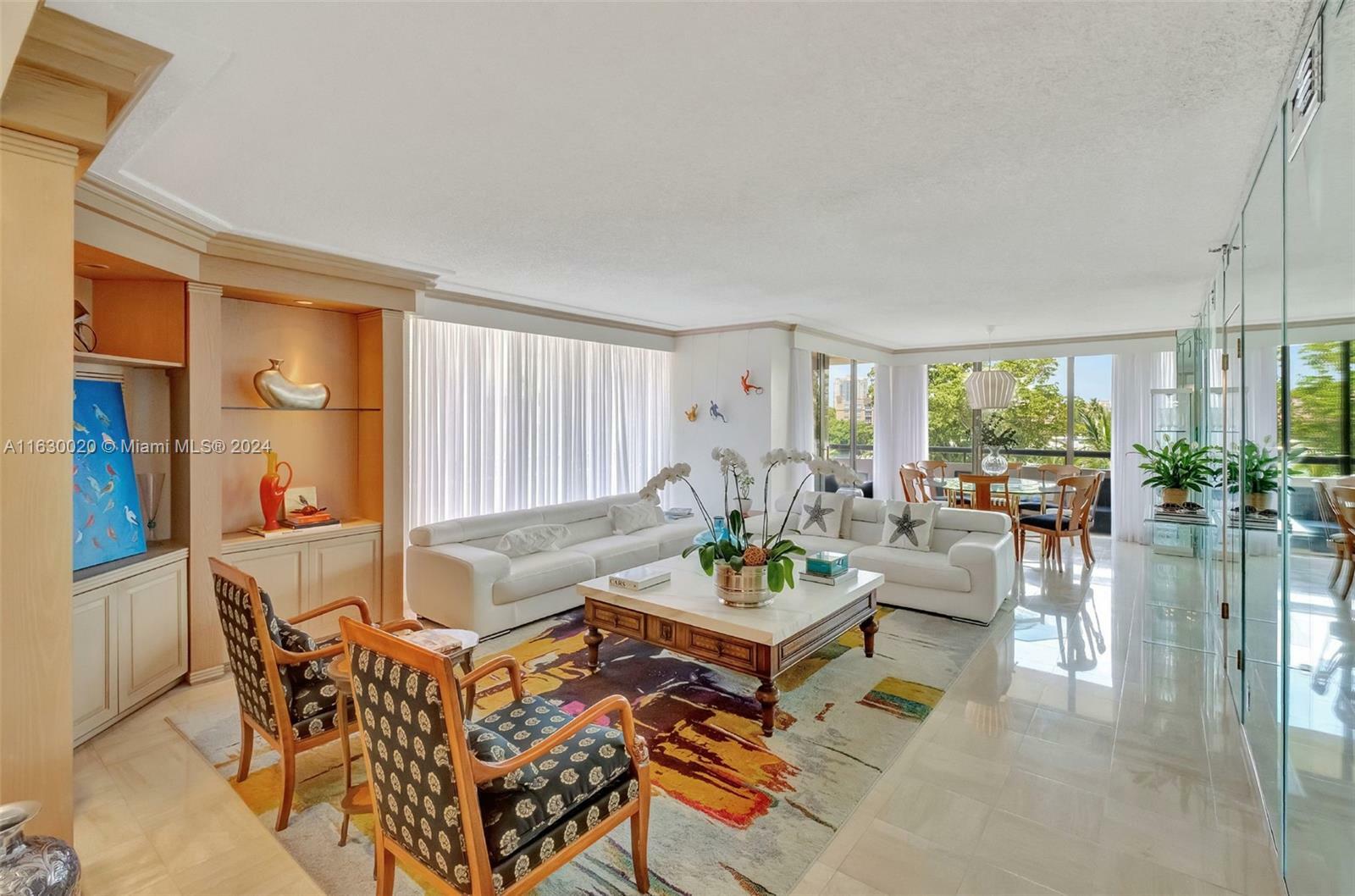 Property Photo:  19667 Turnberry Way 3D  FL 33180 